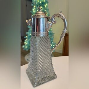 Elegant Silver and Glass Pitcher